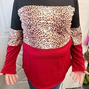 Never worn Lepard red, black striped Shirt